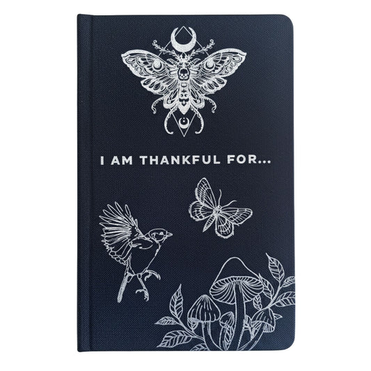 Dankbarkeitstagebuch I Am Thankful For – dunkles Cover mit weißen Illustrationen von Schmetterling, Vogel und Blumen